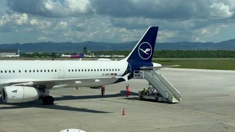 Sofia, Bulgaria - June 08, 2026: Lufthansa aircraft on the tarmac is being board Stock Footage 341692271