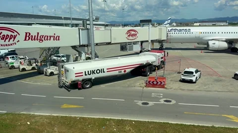 Sofia, Bulgaria - June 08, 2026: A fuel truck labeled Lukoil refuels a Lufthansa Stock-Footage 341692272