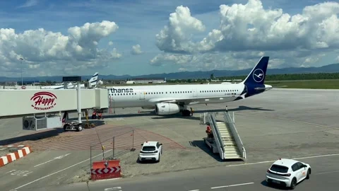 Sofia, Bulgaria - June 08, 2026: Lufthansa airplane parked at the airport gate w Stock Footage 341692285