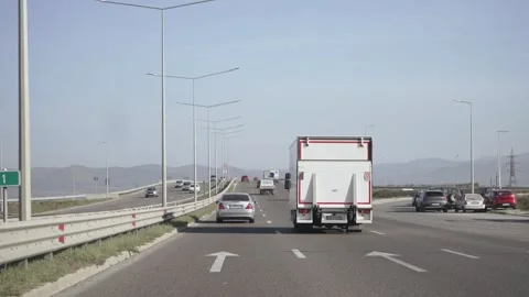 Sofia, Bulgaria - Mar 12, 2025: Highway traffic scene with various vehicles,  Stock Footage 317624678