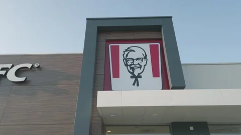 Sofia, Bulgaria - Mar 12, 2025: Modern KFC restaurant exterior featuring a br Stock Footage 320972372