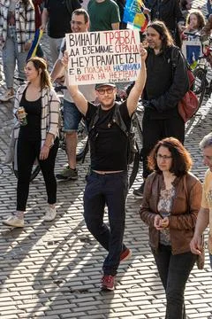 Sofia, Bulgaria - May 09, 2022: A man walks at pro-Ukranian demonstration Stock Photos