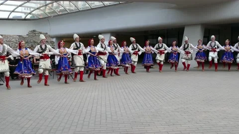 SOFIA, BULGARIA - MAY 2, 2018: People dance bulgarian horo in Sofia, Bulgaria. Stockbeeldmateriaal 153476197