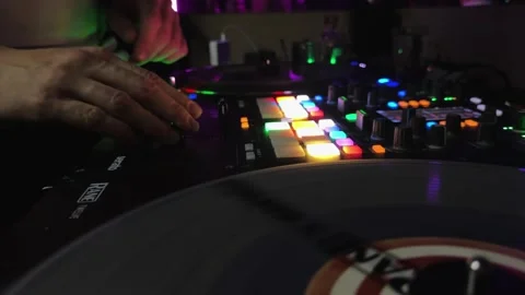 Sofia, Bulgaria - Oct 22, 2023: Party maker person is playing a DJ set with a Stock Footage 294973614