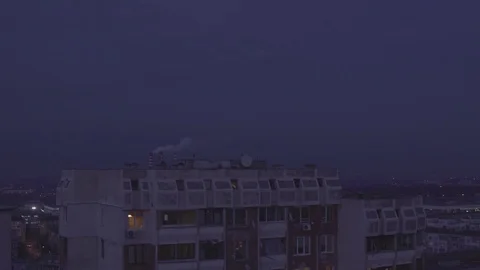 Sofia Cityscape Chimney Smoke Blocks at Night 4K Stock Footage 71775504