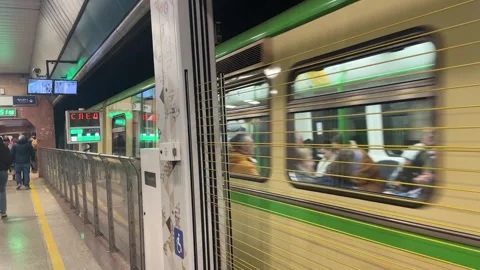 Sofia Metro Train Leaving Platform Into Tunnel Passengers Using Staircase 動画素材 323914400