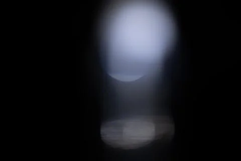 Soft abstract bokeh light flare on dark background Stock Photos