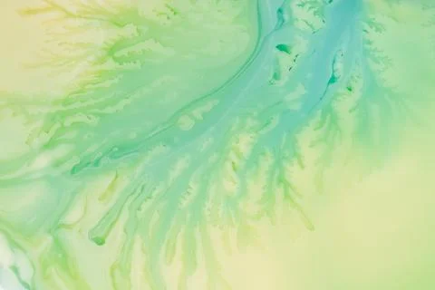 Soft abstract green and turquoise fluid texture forming organic marbling on a Stock Illustration