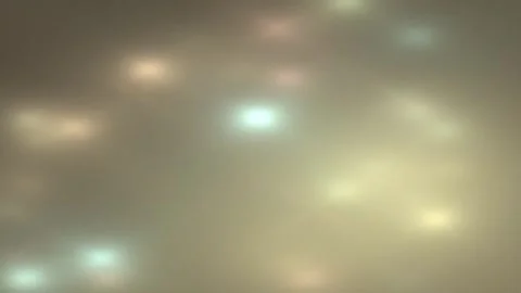 Soft Abstract Lights Drift Across Shimmering Surface Stock Footage 327946002