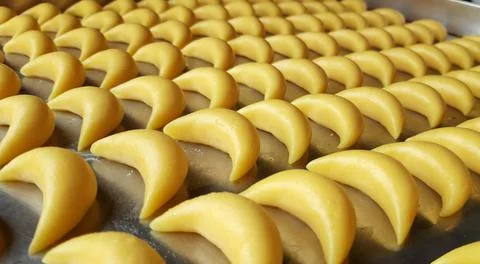Soft and buttery putri salju cookies coated in powdered sugar, offering a m.. Stock Photos