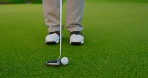 A soft and controlled putt Stock Footage 102410054