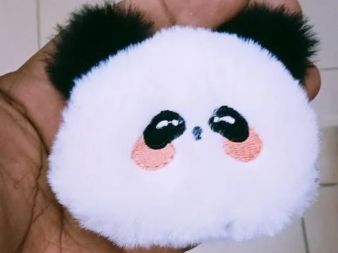 A soft and cute panda bear toy Stock Photos
