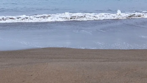 Soft and delicate waves flowing on smooth sandy coast. Stock Footage 99904603