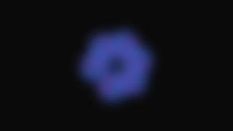 A soft and ethereal blue hexagonal bokeh light glow against a dark background Stock Footage 339619287