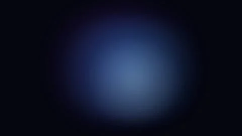 A soft and ethereal blue light glow centered against a deep black background 動画素材 338309538