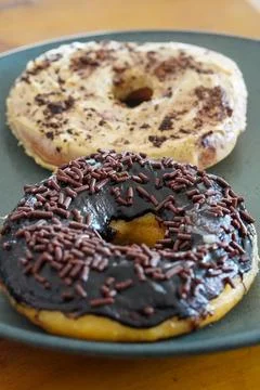 Soft and fluffy donuts dusted with fine sugar Stock Photos