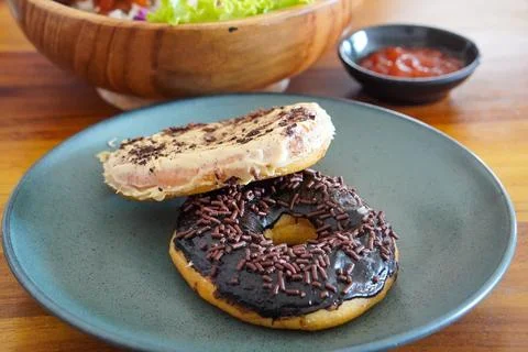 Soft and fluffy donuts dusted with fine sugar Stock Photos