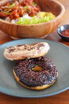 Soft and fluffy donuts dusted with fine sugar Stock Photos