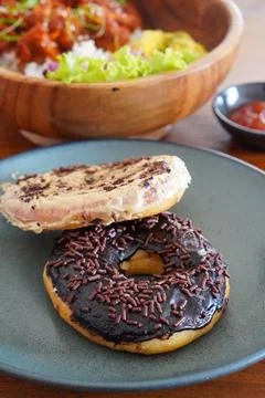 Soft and fluffy donuts dusted with fine sugar Stock Photos