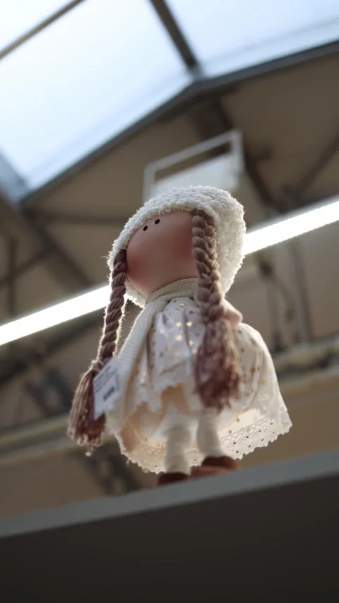Soft angel doll hanging in a retail store as holiday decor Stock Footage 324760706