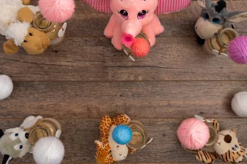 Soft animals with single thread ball each, top view Foto stock