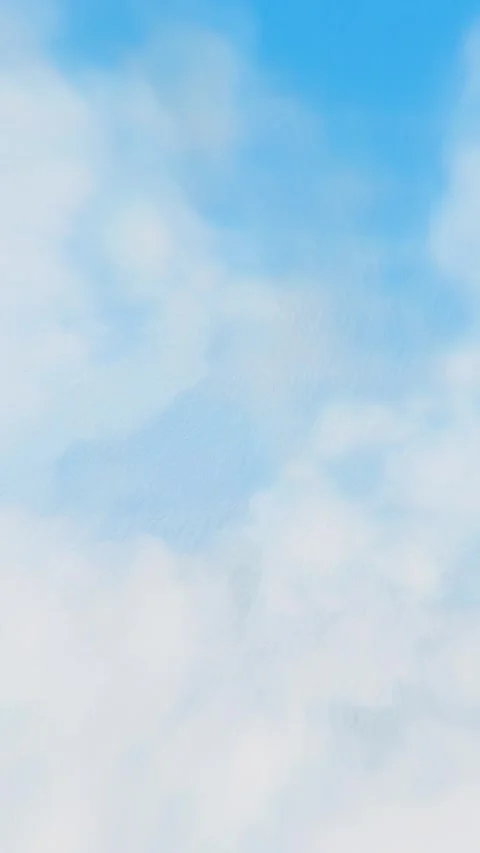 A soft, animated cloud movement in a bright blue sky. 스톡 동영상 304048385