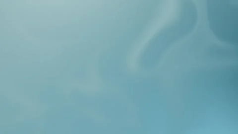 Soft aqua gradient with smooth, flowing shapes. Seamless loop background. 4K. Stock Footage 309956814