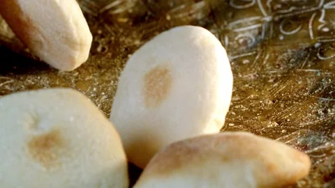 Soft Arabic bread, warm and round, baked with love, a taste profound Stock Footage 291688644