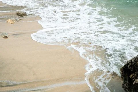 Soft Beach Waves Rolling to the Shore, Glimmering in the Sunlight, Inviting.. Stock Photos