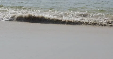 Soft beautiful sea waves on sandy beach Video stock 148831431