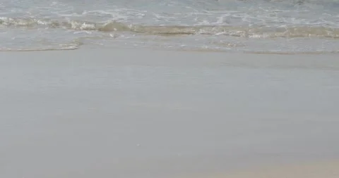 Soft beautiful sea waves on sandy beach Видео 148831500