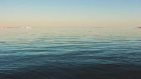 Soft beautiful water waves reflecting the rays of the sun Stock Footage 114785249