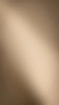 Soft beige and brown gradient grainy texture abstract background template w.. Stock Photos