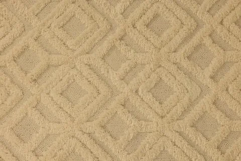Soft beige carpet with pattern as background, top view Stock Photos