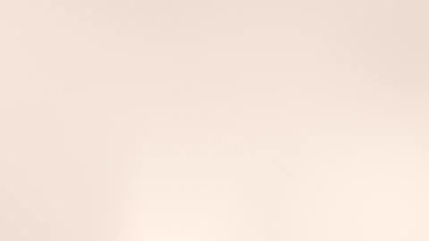 Soft beige gradient seamless loop background in 4K resolution. Stock Footage 309855609