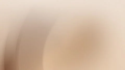 Soft beige gradient with smooth transition and blurred edges, perfect for a Stock Footage 299664571