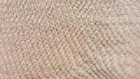 Soft beige ribbed knit texture closeup seamless pattern neutral background .. Stock Photos