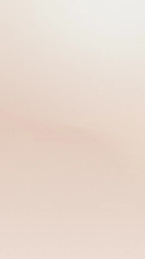 Soft beige seamless loop background with gentle gradients, 4K quality. Vídeo Stock 309956970