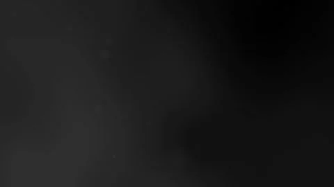 Soft Black Gradient Background with Floating Particles for Modern Design Stock Footage 312100869