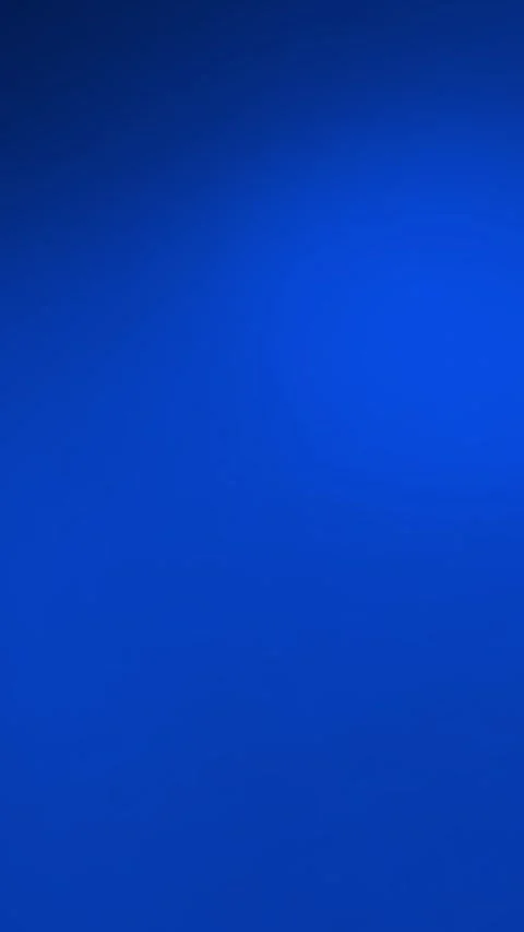 Soft blue and white light leak for a gentle overlay, vertical format Stock Footage 340131540