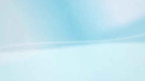 Soft blue and white waves of light flow in a seamless loop Stock Footage 342949292