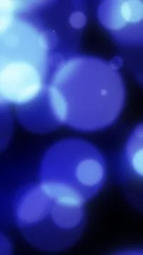 Soft blue bokeh light orbs on dark background, dreamy defocused glow with s.. 스톡 일러스트