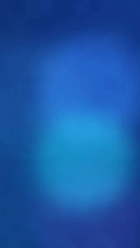 Soft blue bokeh lights loop motion background with blur effect Vidéo 346740637