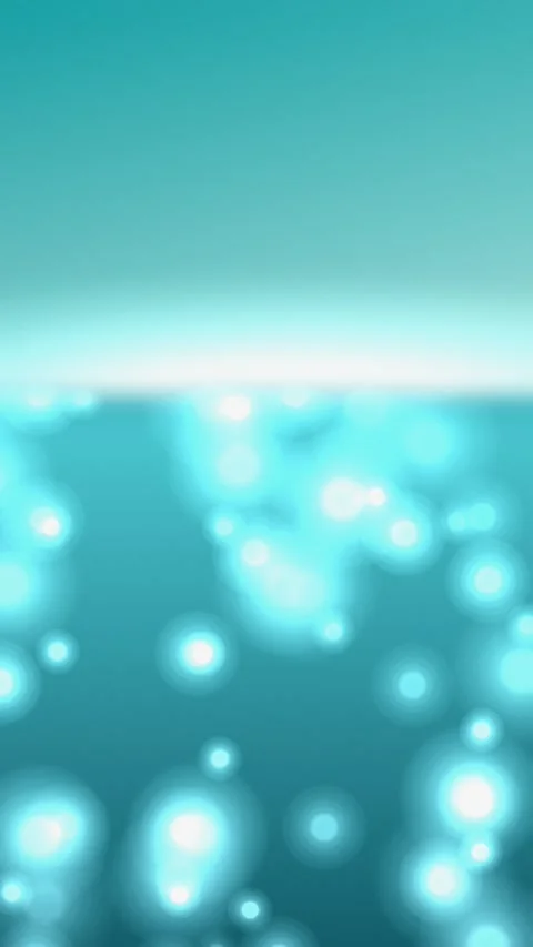 Soft blue bokeh lights on teal background. 2d animation 動画素材 345217633
