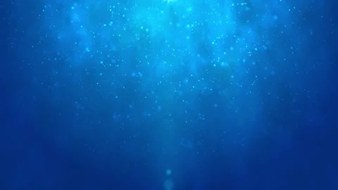 Soft blue bokeh particle visual gentle cyan glow, floating specks, and clean atm Stock Footage 340570878