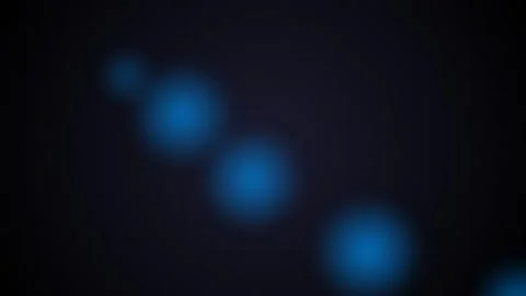 Soft blue glowing circles floating against a deep dark black background Stock Footage 339616556