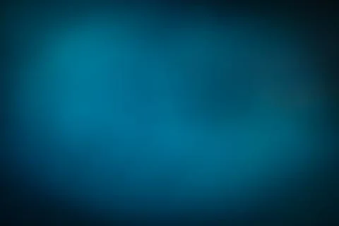 Soft blue gradient background with smooth transitions and gentle light. Stock Photos