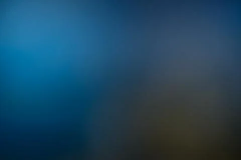 Soft blue gradient background with smooth transitions and gentle light. Stock Photos