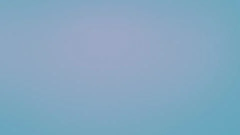 Soft blue gradient background with subtle grain texture. Seamless loop Vídeos de archivo 309956187