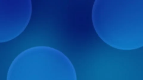 Soft blue gradient with circular bokeh shapes, creating a smooth abstract 4K Stockbeeldmateriaal 309701139